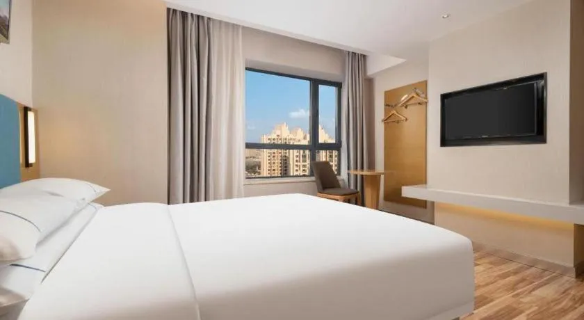 Bed in City Comfort Inn Jingzhou Wanda Plaza