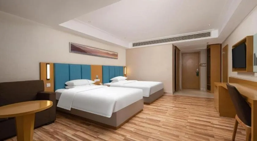 Bed in City Comfort Inn Jingzhou Wanda Plaza