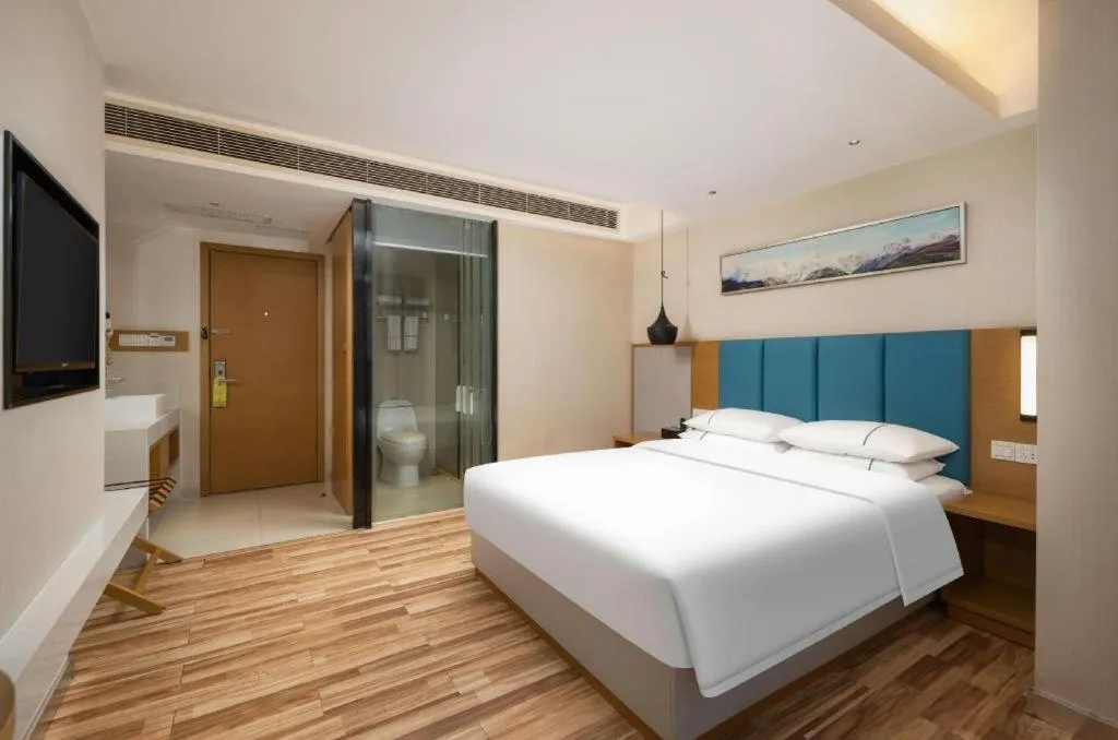 Bed in City Comfort Inn Jingzhou Wanda Plaza