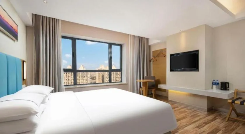 Bed in City Comfort Inn Jingzhou Wanda Plaza
