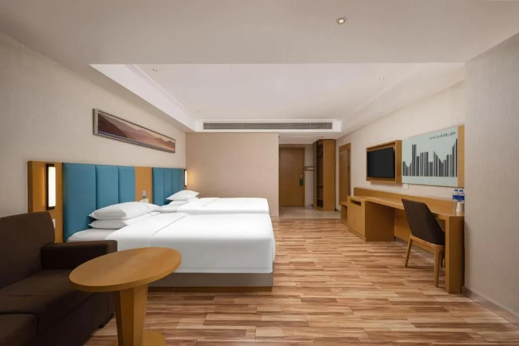 Bed in City Comfort Inn Jingzhou Wanda Plaza