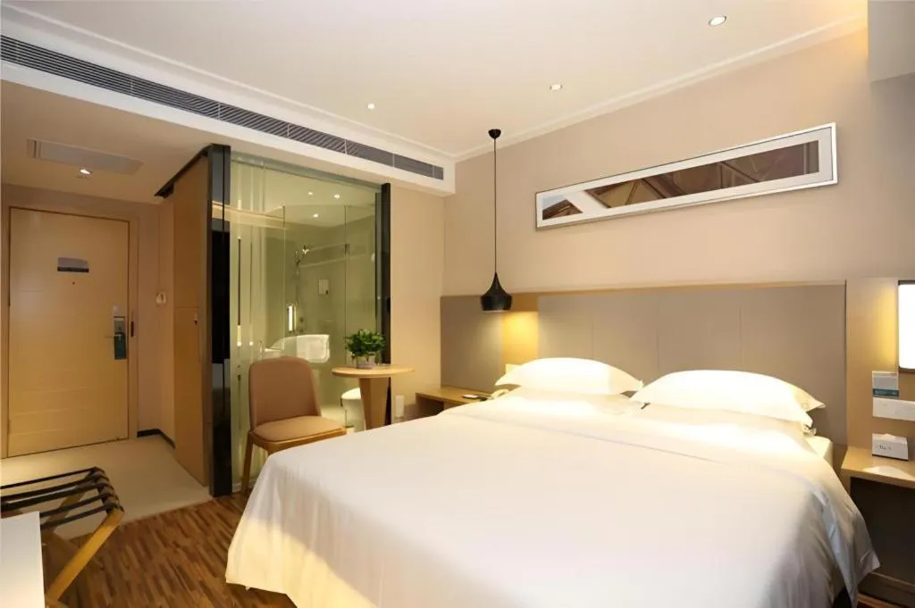 Bed in City Comfort Inn Changsha Jingwanzi Desiqin Plaza