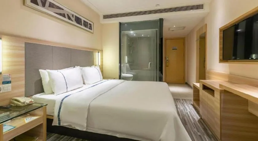 Bed in City Comfort Inn Changsha Jingwanzi Desiqin Plaza