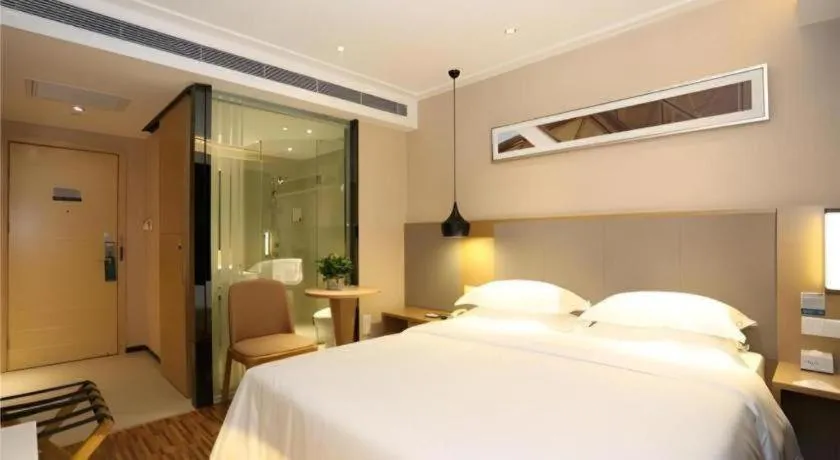 Bed in City Comfort Inn Changsha Jingwanzi Desiqin Plaza