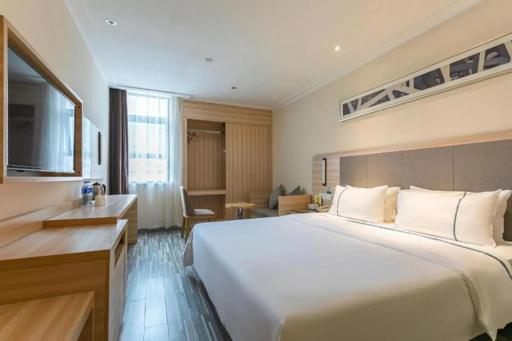 Bed in City Comfort Inn Changsha Jingwanzi Desiqin Plaza