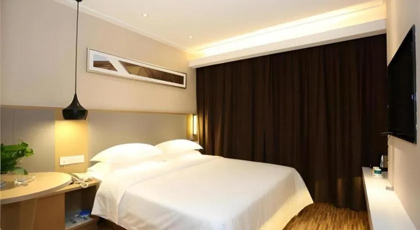 Bed in City Comfort Inn Changsha Jingwanzi Desiqin Plaza