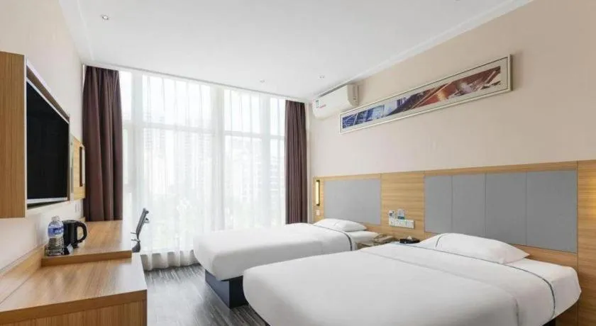 Bed in City Comfort Inn Changsha Jingwanzi Desiqin Plaza