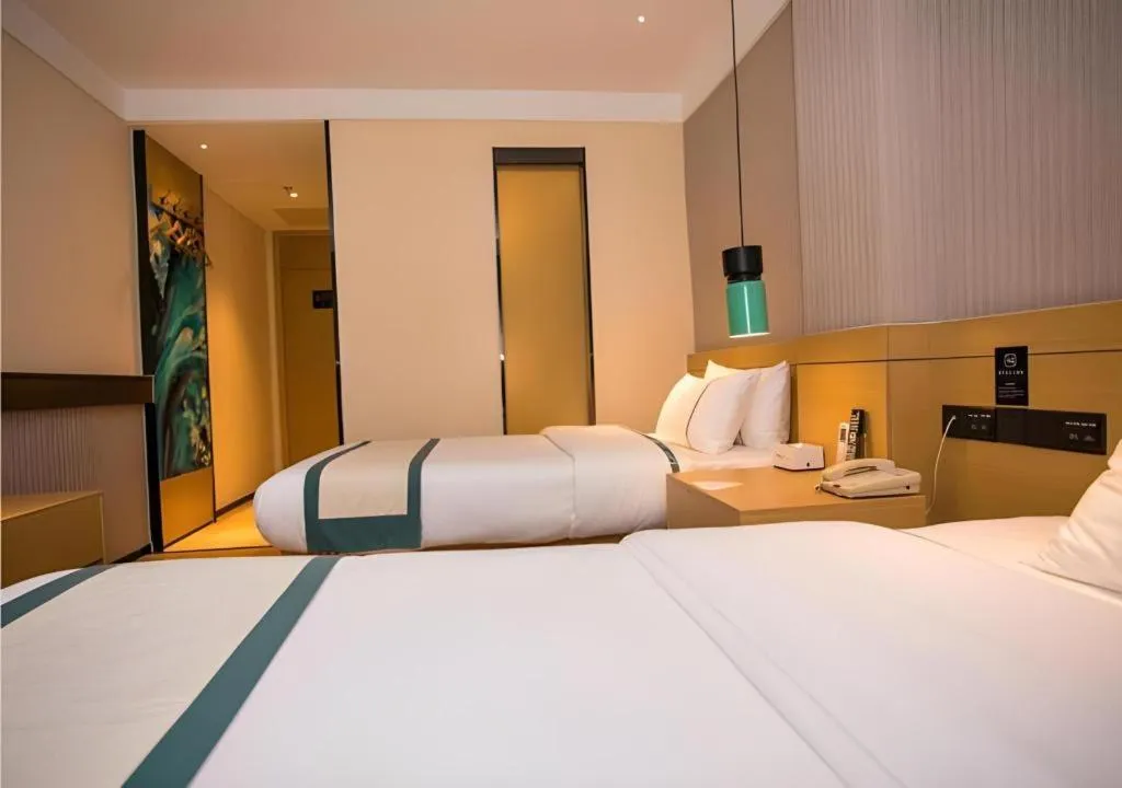 Bed in City Comfort Inn Wuhan Daxueyuan Road Qingfeng Villa