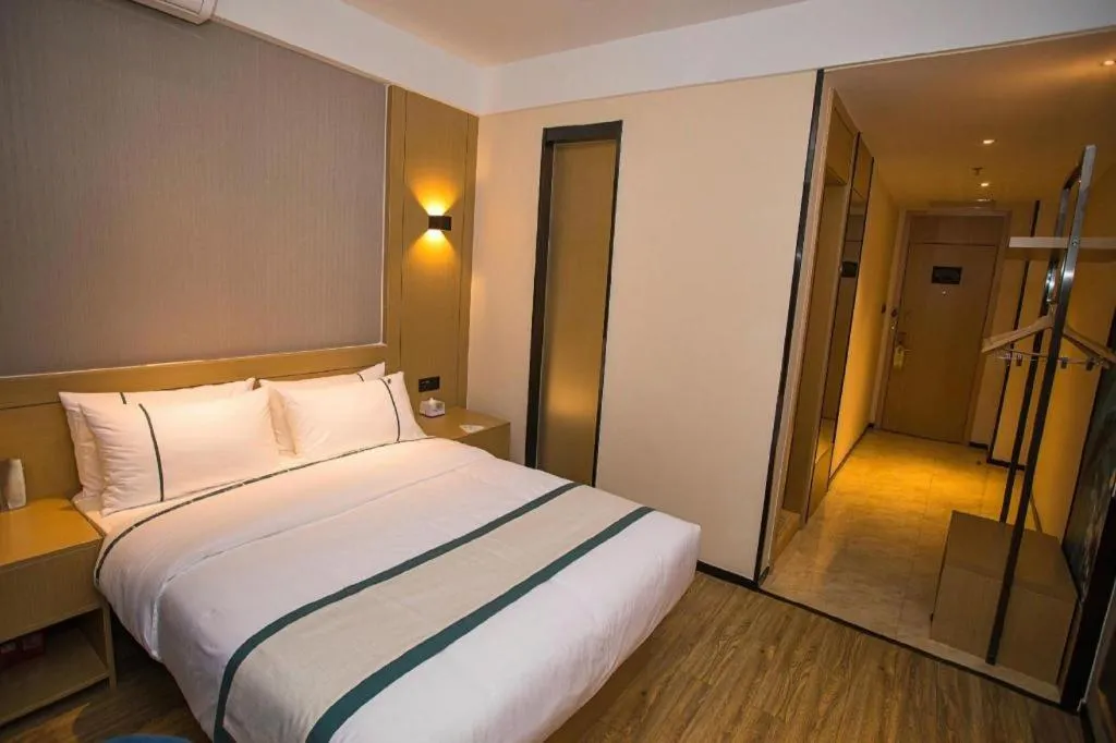 Bed in City Comfort Inn Wuhan Daxueyuan Road Qingfeng Villa