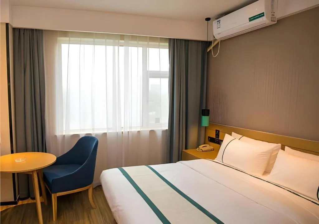 Bed in City Comfort Inn Wuhan Daxueyuan Road Qingfeng Villa