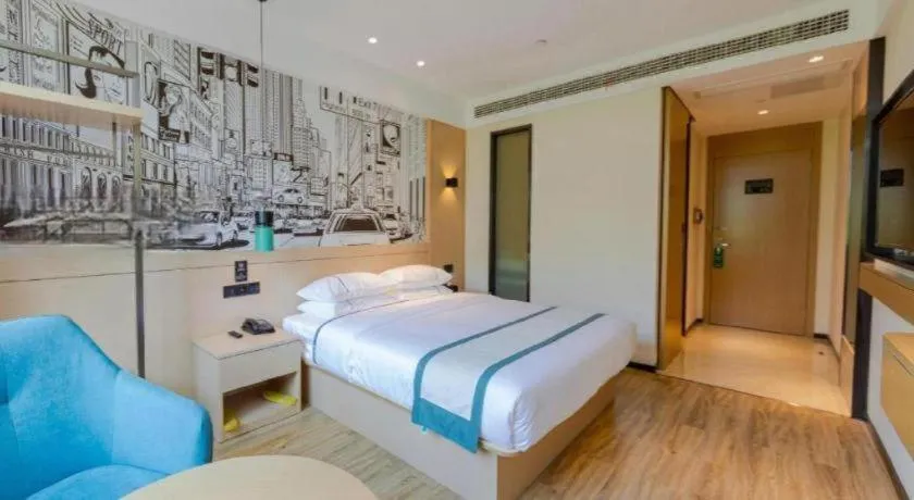 Bed in City Comfort Inn Wuhan Daxueyuan Road Qingfeng Villa