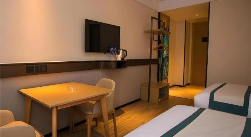 Bed in City Comfort Inn Wuhan Daxueyuan Road Qingfeng Villa