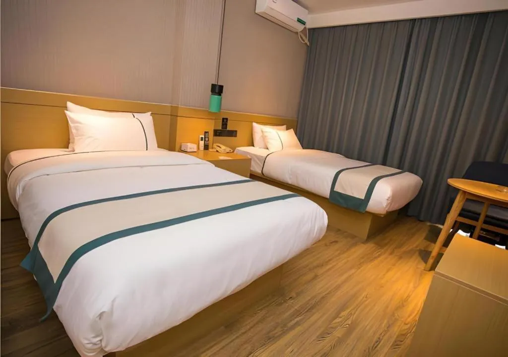 Bed in City Comfort Inn Wuhan Daxueyuan Road Qingfeng Villa