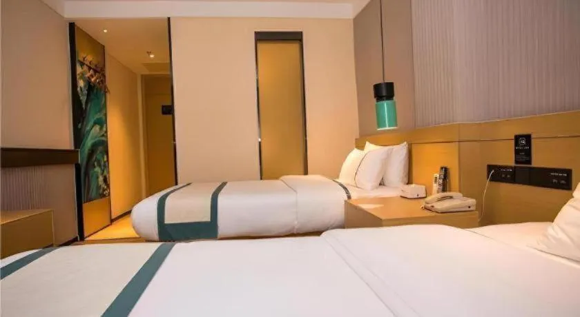 Bed in City Comfort Inn Wuhan Daxueyuan Road Qingfeng Villa