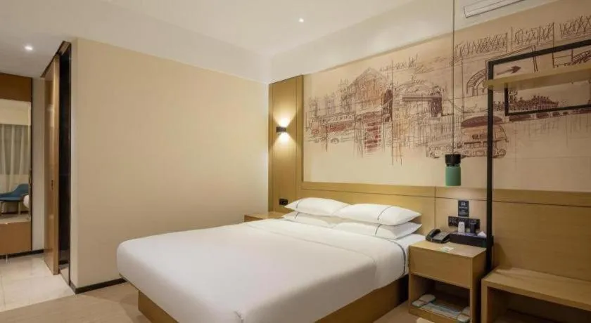 Bed in City Comfort Inn Wuhan Daxueyuan Road Qingfeng Villa