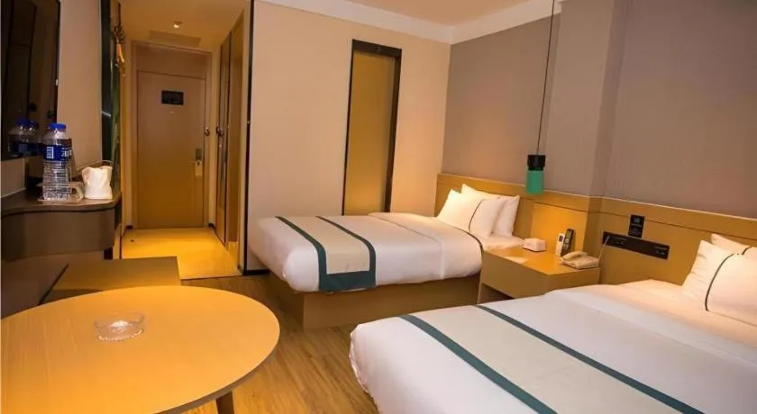 Bed in City Comfort Inn Wuhan Daxueyuan Road Qingfeng Villa