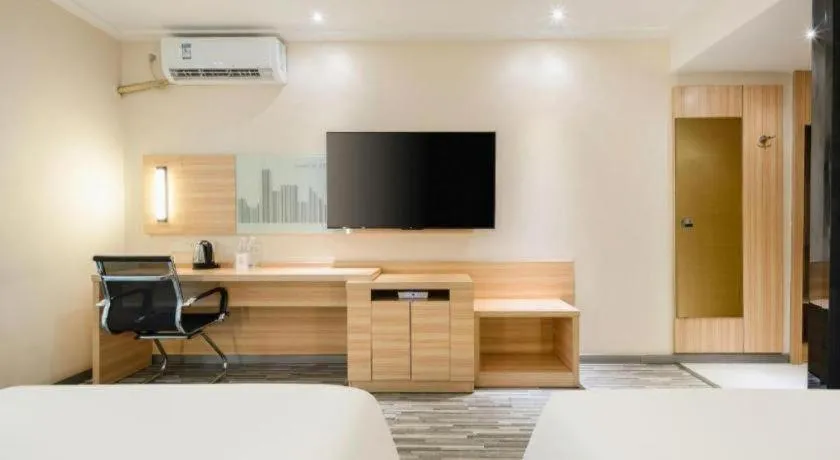 Bed in City Comfort Inn Hechi Chengxi Avenue