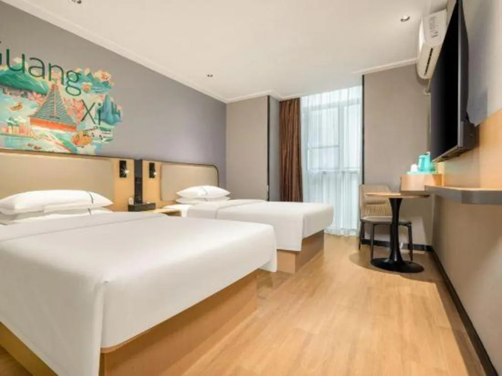 Bed in City Comfort Inn Hechi Chengxi Avenue