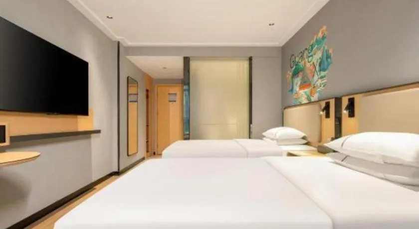 Bed in City Comfort Inn Hechi Chengxi Avenue