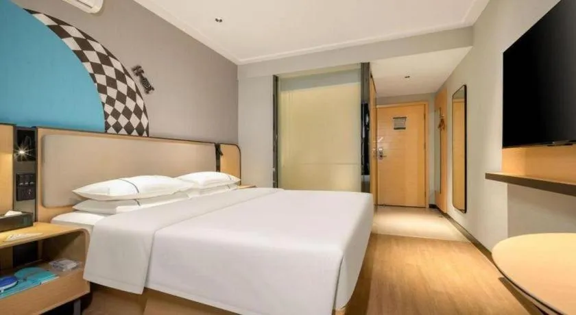 Bed in City Comfort Inn Hechi Chengxi Avenue