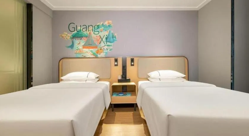 Bed in City Comfort Inn Hechi Chengxi Avenue