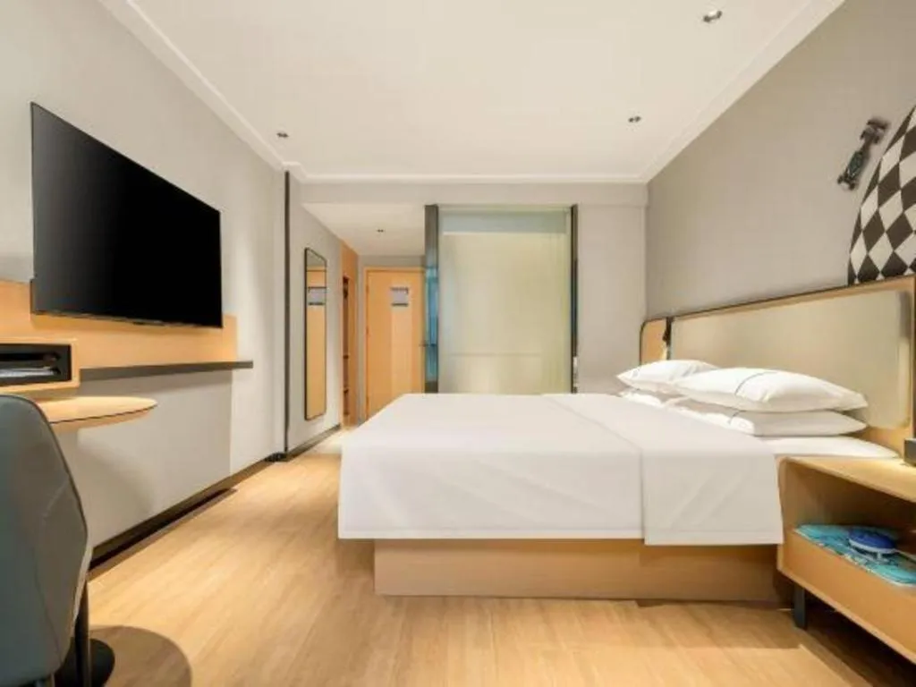 Bed in City Comfort Inn Hechi Chengxi Avenue