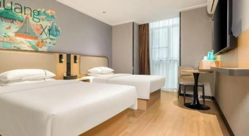 Bed in City Comfort Inn Hechi Chengxi Avenue