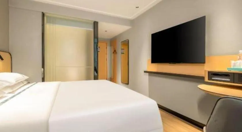 Bed in City Comfort Inn Hechi Chengxi Avenue