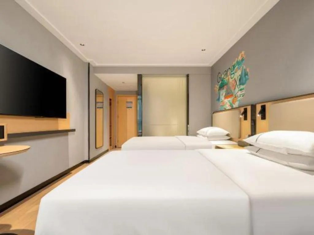 Bed in City Comfort Inn Hechi Chengxi Avenue