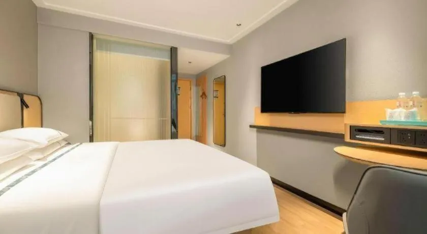 Bed in City Comfort Inn Hechi Chengxi Avenue