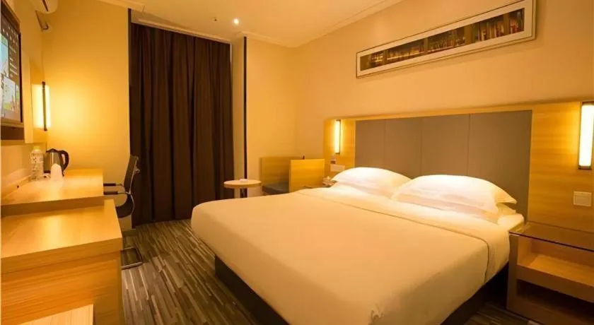 Bed in City Comfort Inn Hechi Chengxi Avenue
