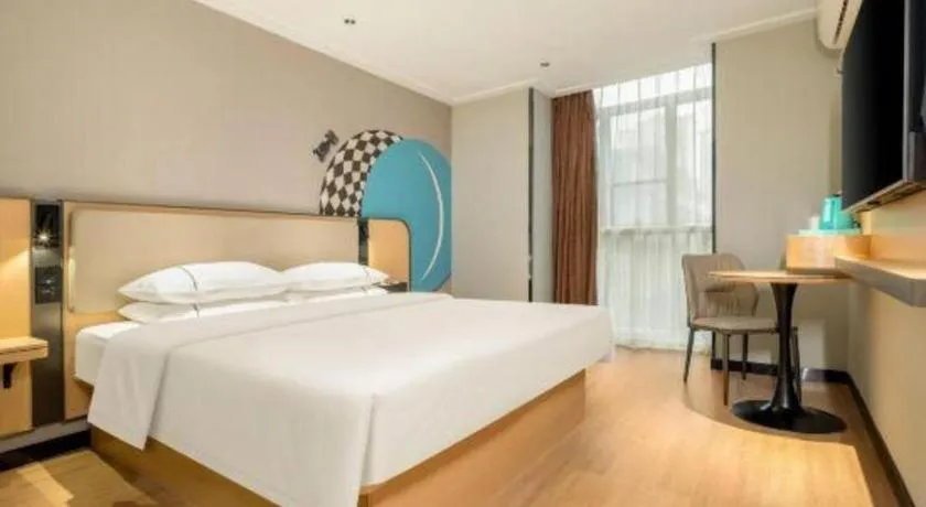 Bed in City Comfort Inn Hechi Chengxi Avenue