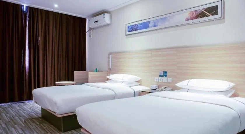 Bed in City Comfort Inn Tianmen East Lake Wanda Plaza