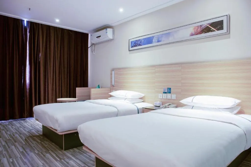 Bed in City Comfort Inn Tianmen East Lake Wanda Plaza