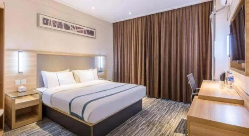 Bed in City Comfort Inn Zhongshan Xiaolan Xinduhui Gymnasium