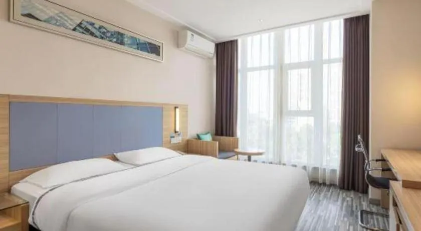 Bed in City Comfort Inn Zhongshan Xiaolan Xinduhui Gymnasium