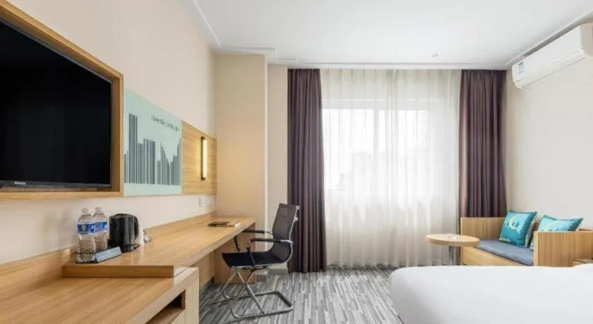 Bed in City Comfort Inn Zhongshan Xiaolan Xinduhui Gymnasium