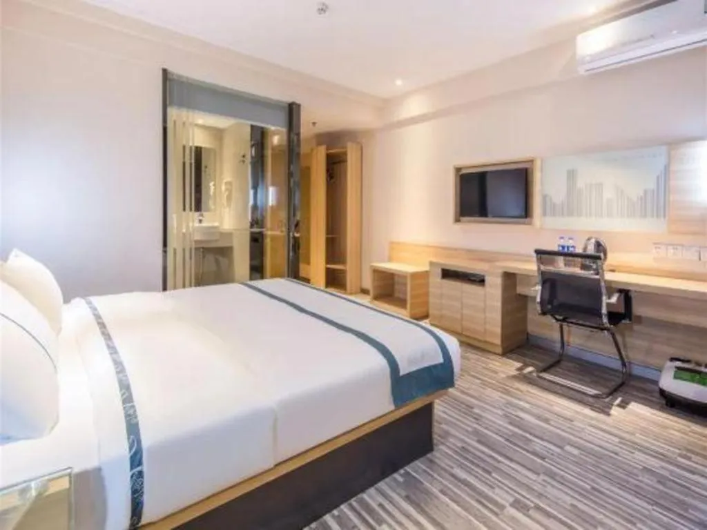 Bed in City Comfort Inn Zhongshan Xiaolan Xinduhui Gymnasium