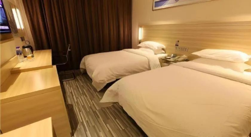 Bed in City Comfort Inn Zhongshan Xiaolan Xinduhui Gymnasium