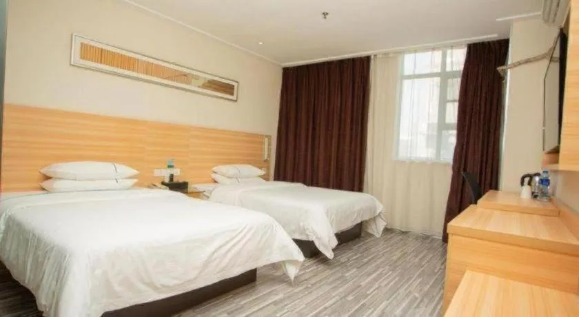 Bed in City Comfort Inn Zhongshan Xiaolan Xinduhui Gymnasium