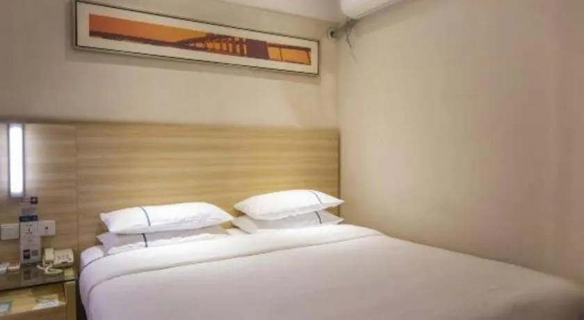 Bed in City Comfort Inn Zhongshan Xiaolan Xinduhui Gymnasium
