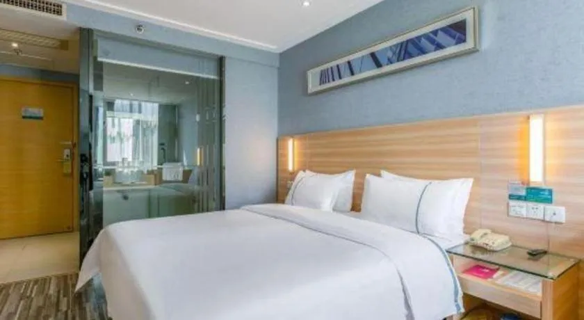 Bed in City Comfort Inn Zhongshan Xiaolan Xinduhui Gymnasium