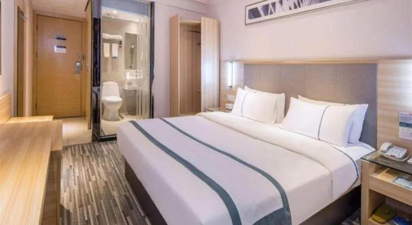 Bed in City Comfort Inn Zhongshan Xiaolan Xinduhui Gymnasium