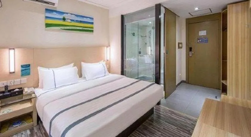 Bed in City Comfort Inn Zhongshan Xiaolan Xinduhui Gymnasium