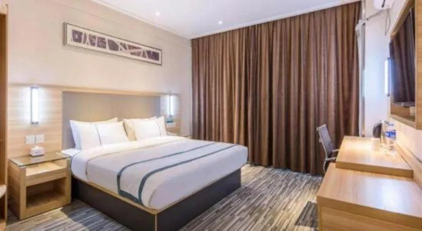 Bed in City Comfort Inn Zhongshan Xiaolan Xinduhui Gymnasium