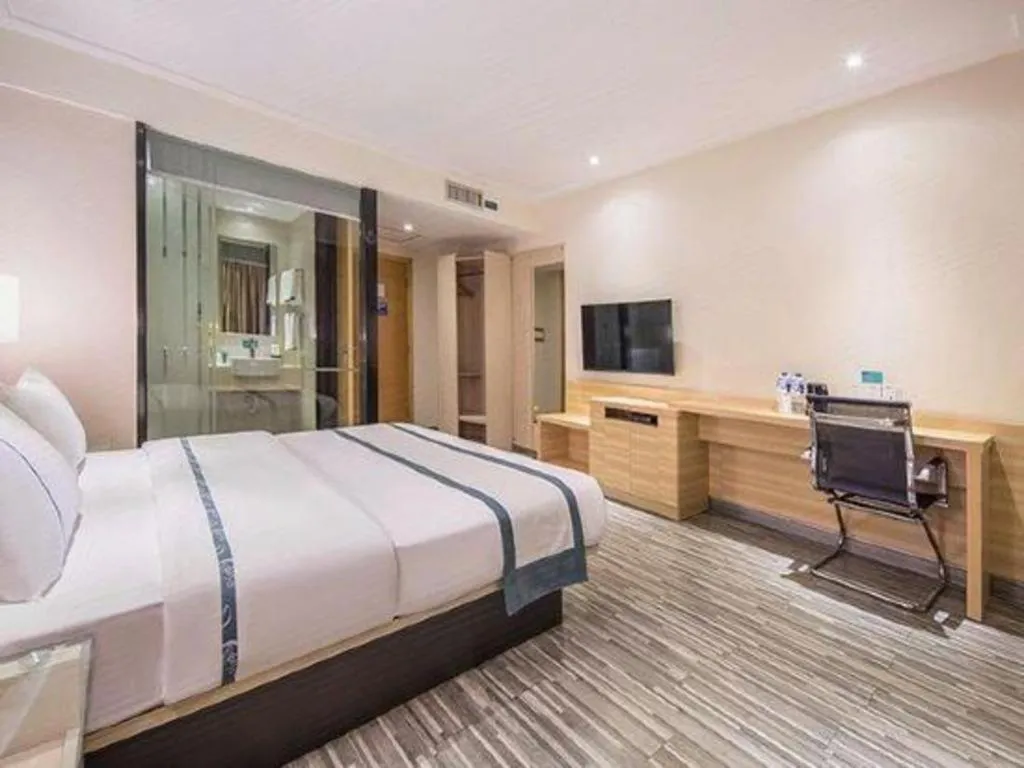 Bed in City Comfort Inn Zhongshan Xiaolan Xinduhui Gymnasium