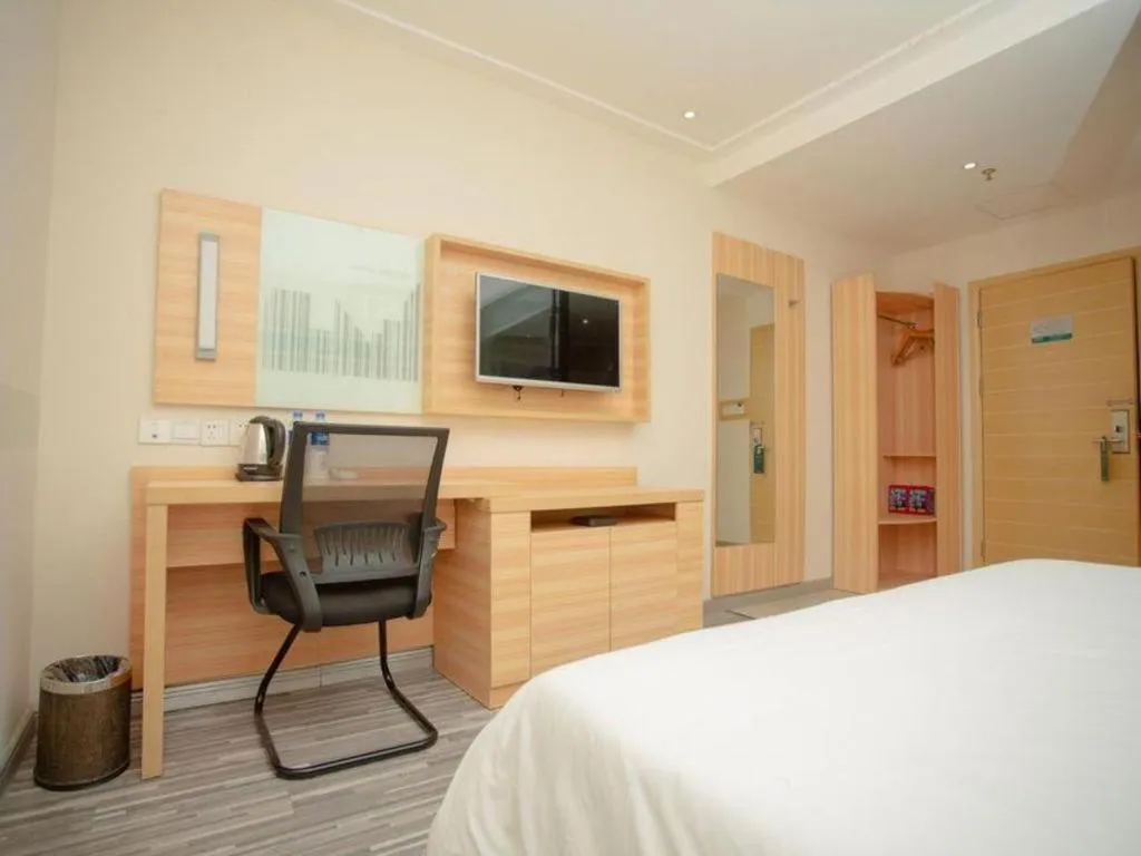 Bed in City Comfort Inn Zhongshan Xiaolan Xinduhui Gymnasium