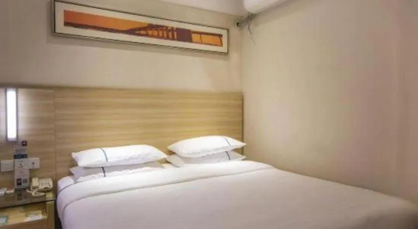Bed in City Comfort Inn Zhongshan Xiaolan Xinduhui Gymnasium