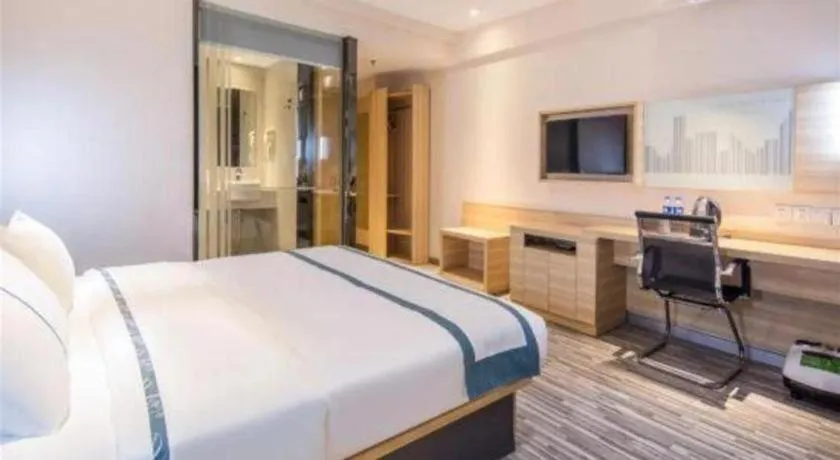 Bed in City Comfort Inn Zhongshan Xiaolan Xinduhui Gymnasium