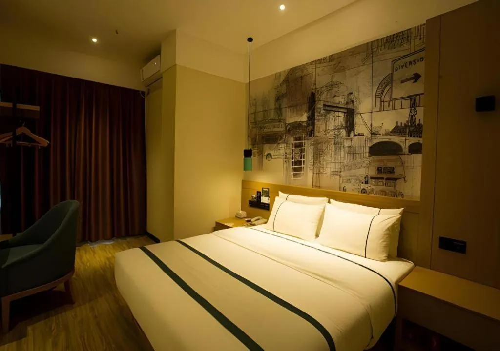 Bed in City Comfort Inn Huanggang Wuxue Bus Center